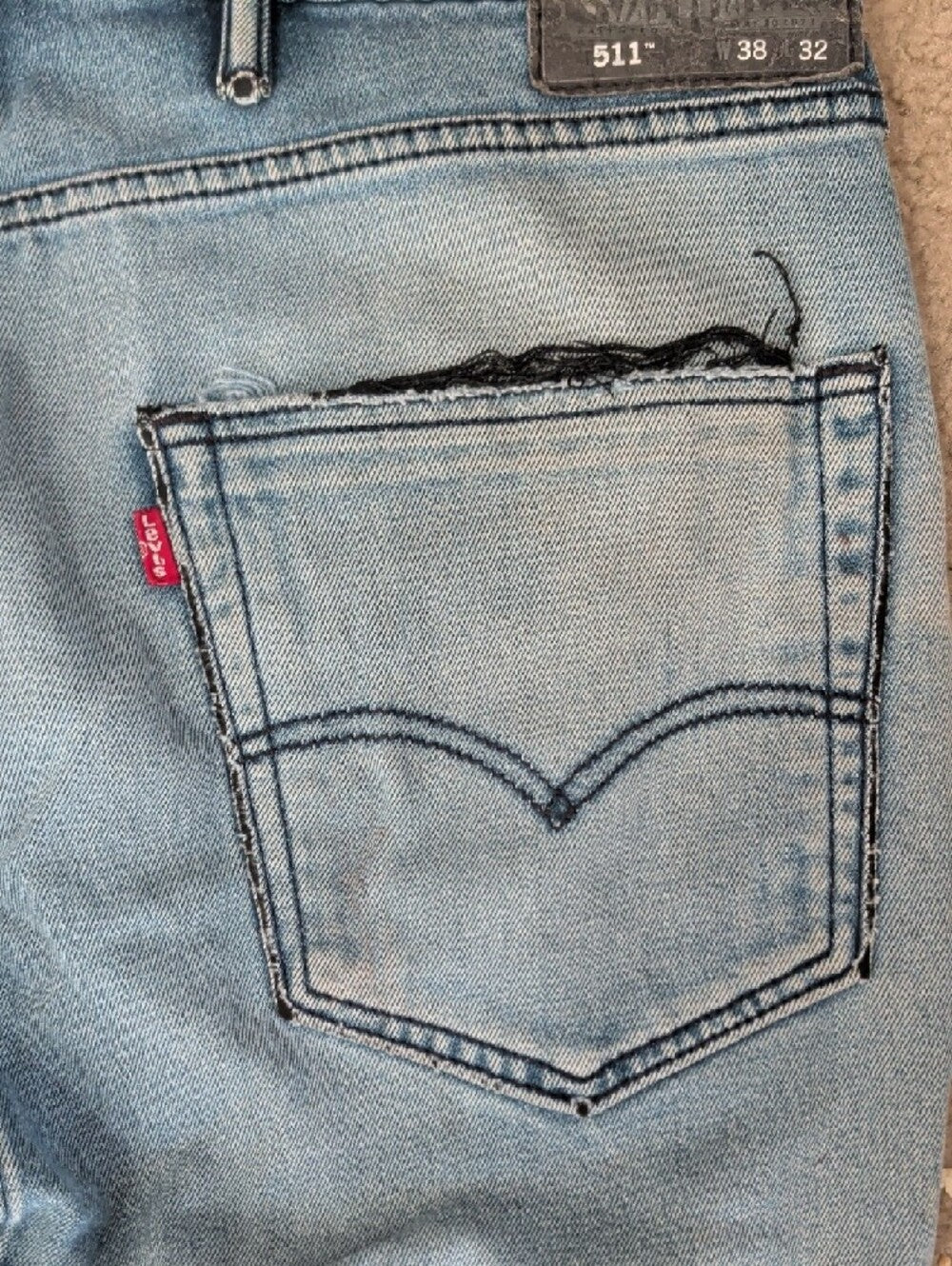 Vintage Levi's 511 Light Blue Distressed Slim Straight Jeans 38x32