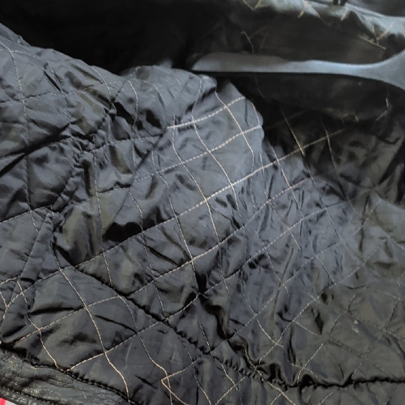 Edgy Black Leather Jacket with Silver Accents Medium