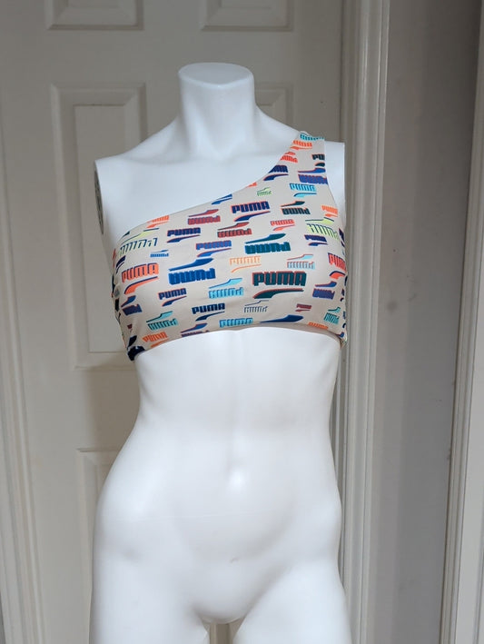 Puma One-Shoulder Sports Bra in Cream with Multicolor Logo Print Women's Medium