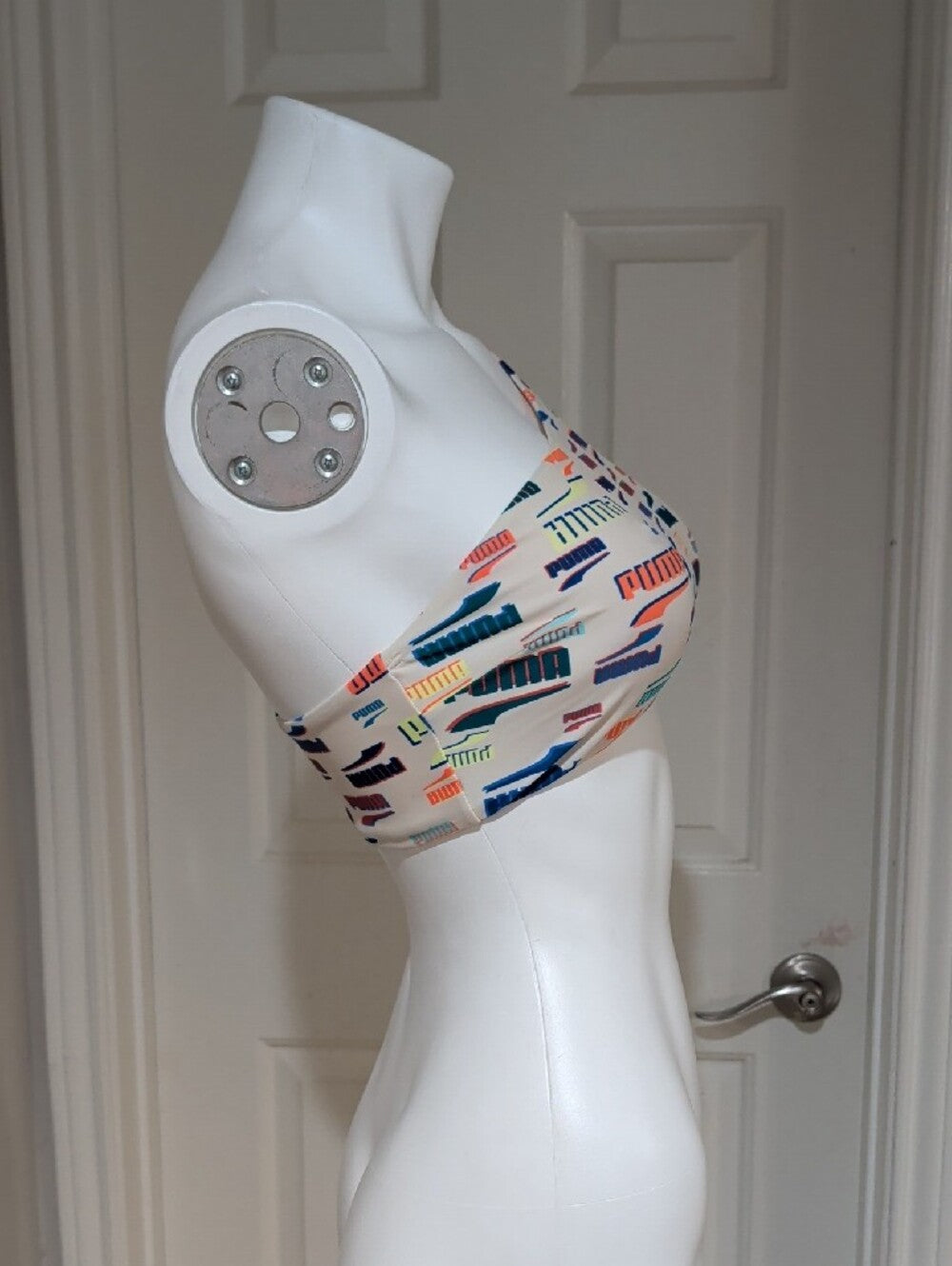 Puma One-Shoulder Sports Bra in Cream with Multicolor Logo Print Women's Medium