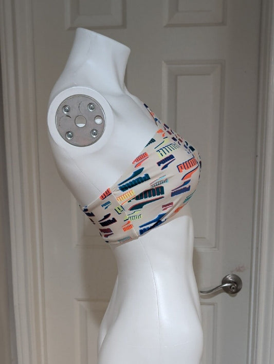 Puma One-Shoulder Sports Bra in Cream with Multicolor Logo Print Women's Medium