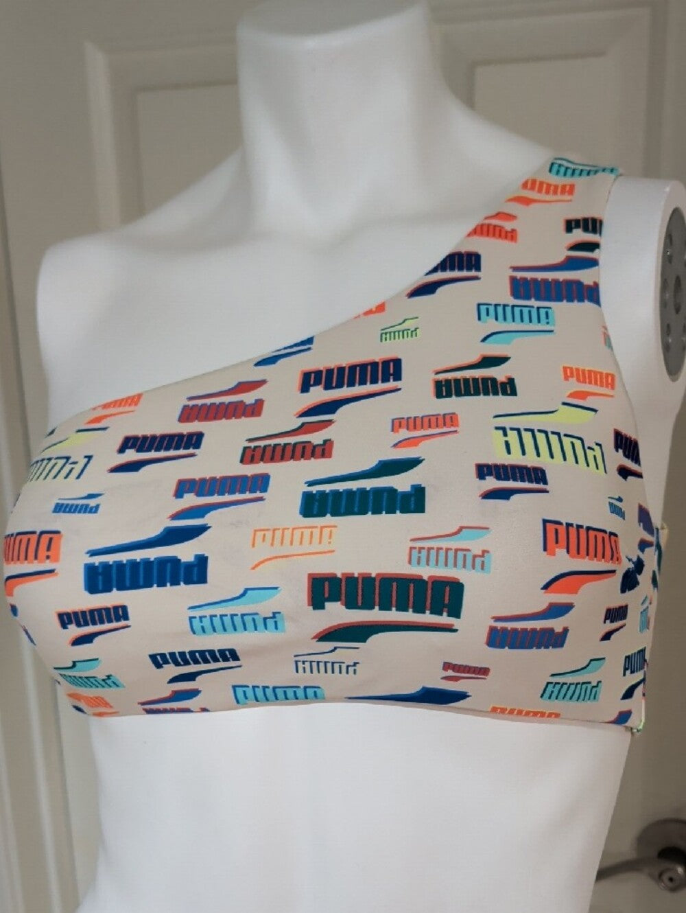 Puma One-Shoulder Sports Bra in Cream with Multicolor Logo Print Women's Medium