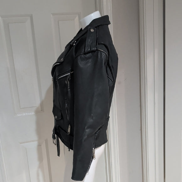 Edgy Black Leather Jacket with Silver Accents Medium