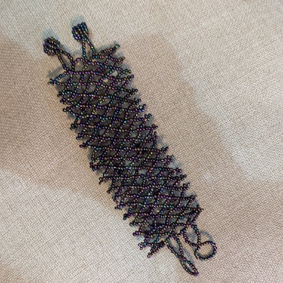 Handcrafted Beaded Bracelet with Purple Tones