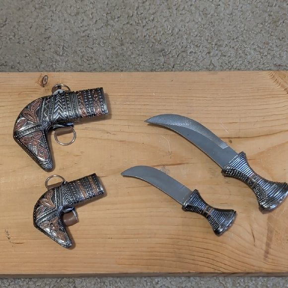 (2) Vintage Intricate Silver and Brown Decorative Daggers (Decorative)