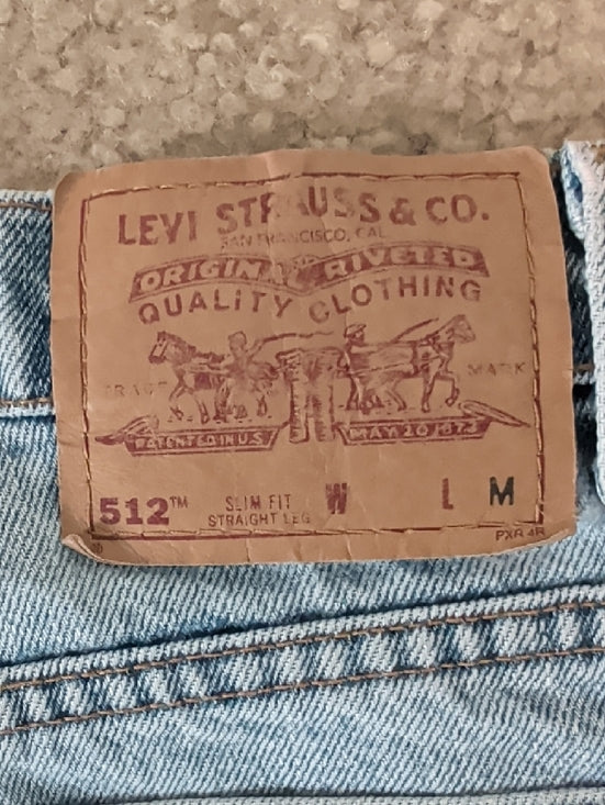 Vintage Levi's Light Blue Distressed Denim Cut-Off Shorts Women's 10
